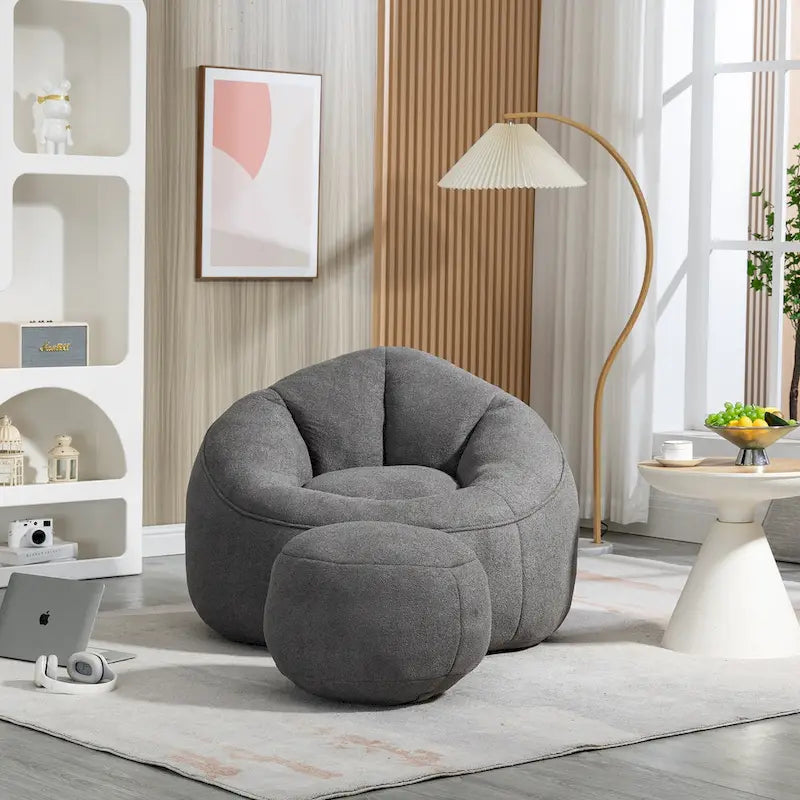 Fauteuil poire-lit avec repose-pieds