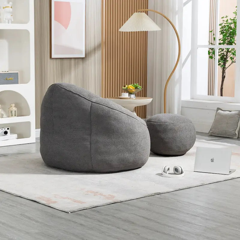 Fauteuil poire-lit avec repose-pieds