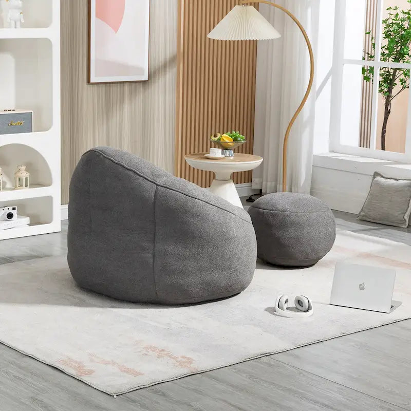 Fauteuil poire-lit avec repose-pieds