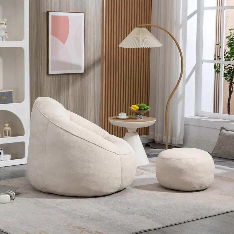 Fauteuil poire-lit avec repose-pieds