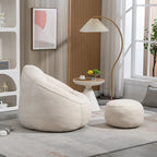 Fauteuil poire-lit avec repose-pieds