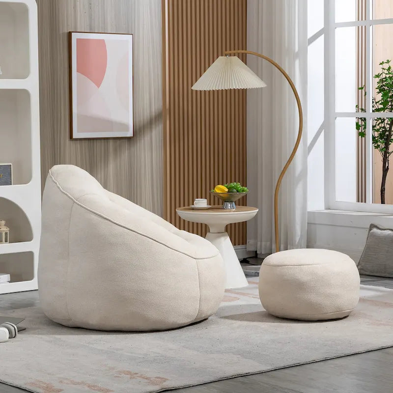 Fauteuil poire-lit avec repose-pieds
