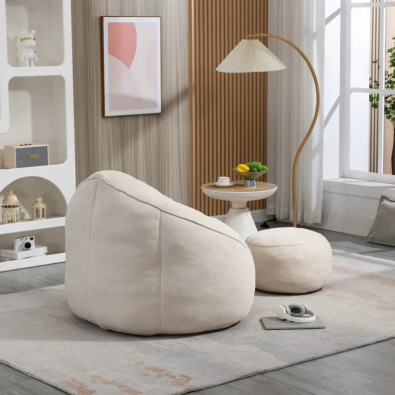 Fauteuil poire-lit avec repose-pieds